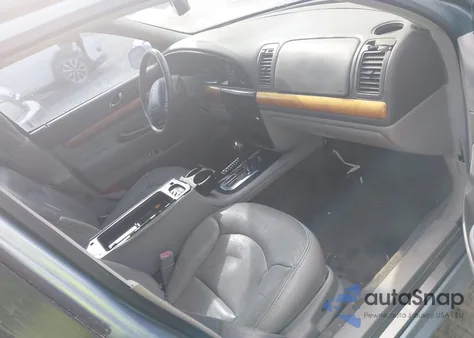 1998 Lincoln Continental z USA, uszkodzony, nr VIN 1LNFM97V2WY739199